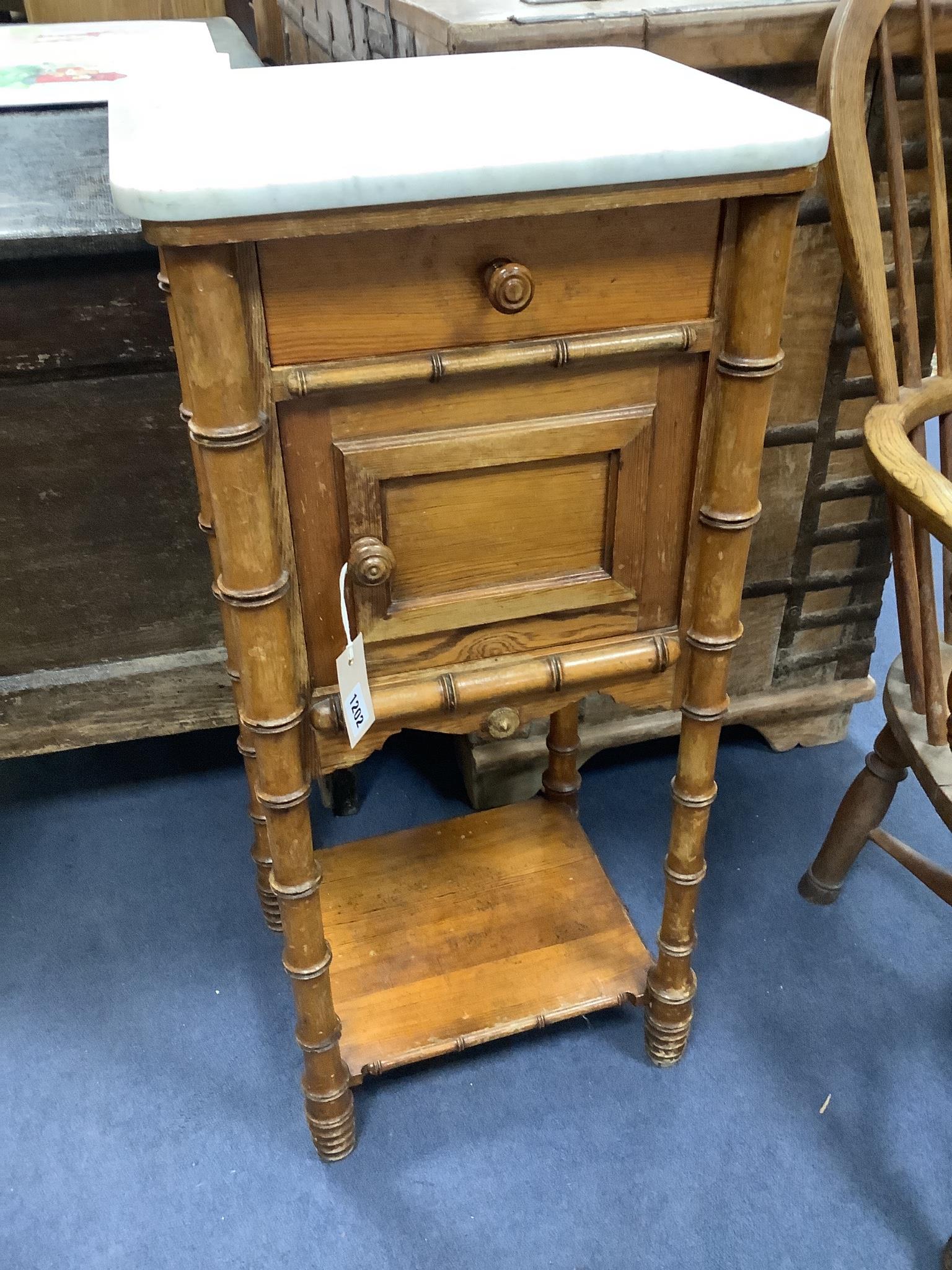 A Victorian pitch pine marble topped faux bamboo bedside cabinet, width 40cm, depth 36cm, height 85cm